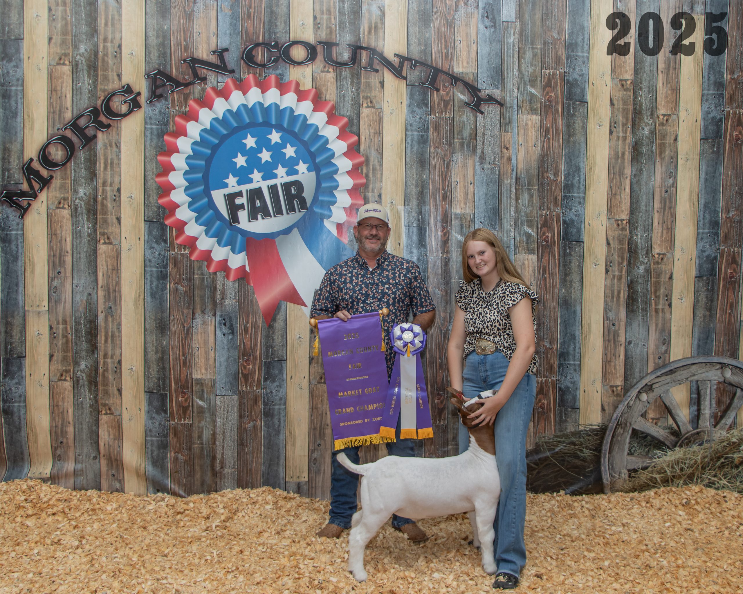 Grand Champion Market Goat - Joslyn Haubert with buyer