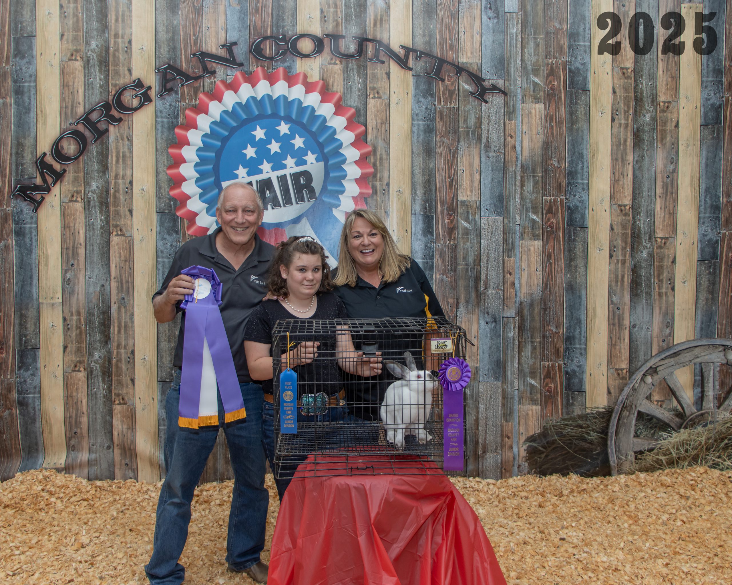 Grand Champion Market Rabbit with Exhibitor and Buyers