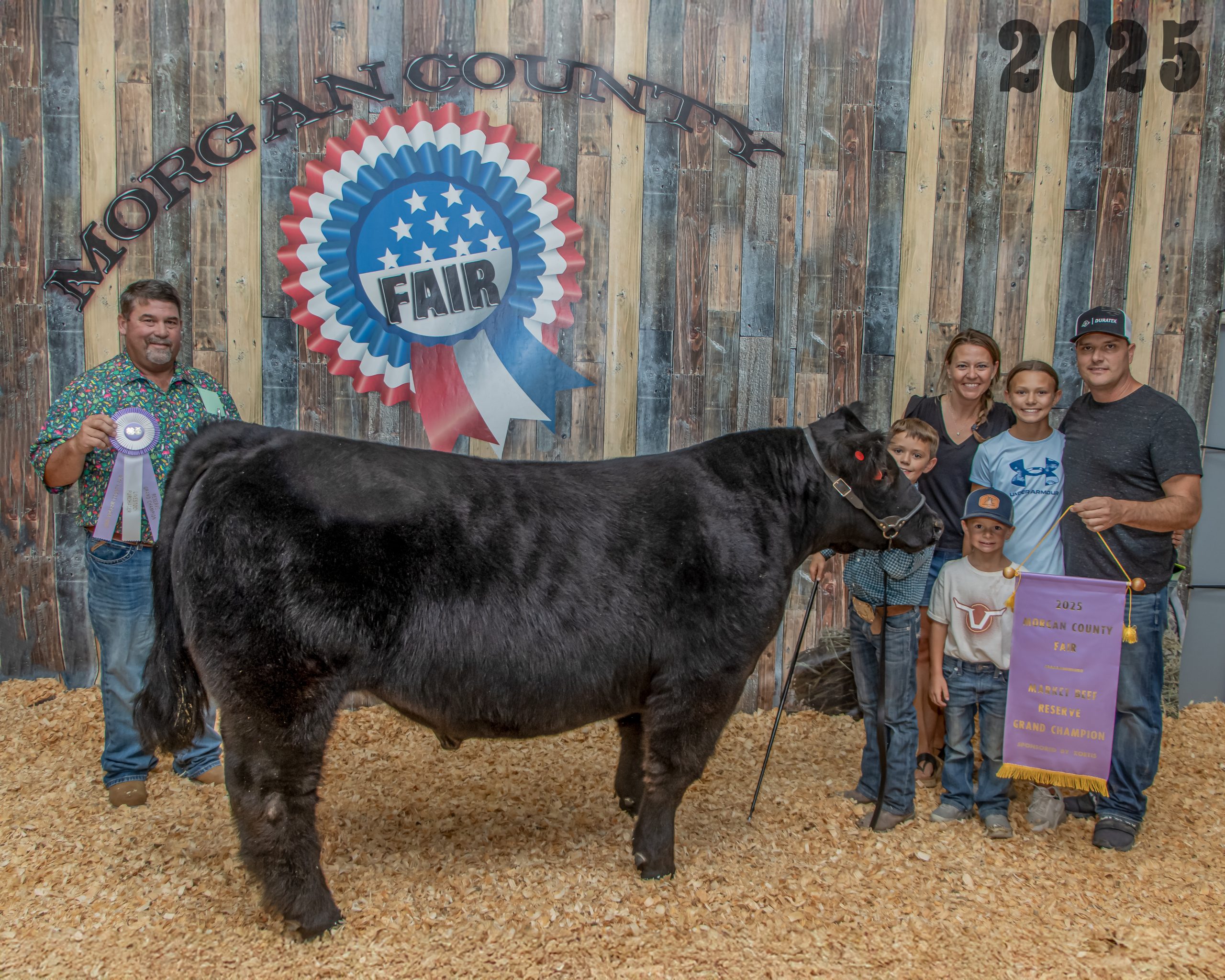 Reserve Grand Champion Market Beef - Case Hansen with buyers